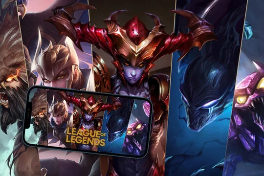 League of Legends (LOL) mobile game app on smartphone screen with the game screen blurred in the background.  Rio de Janeiro, RJ, Brazil. September 2021.