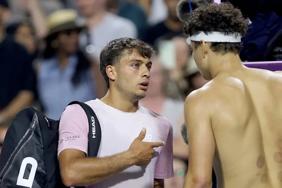Italy’s Flavio Cobolli, left, tells Ben Shelton, right, that he did not make a gesture directed at him following their match at the National Bank Open men’s tennis tournament in Toronto, Sunday, Aug. 3, 2025. Getty Images