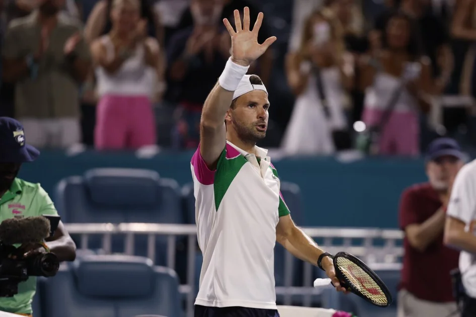 Mar 26, 2025; Miami, FL, USA; Grigor Dimitrov (BUL) waves to the crowd after his match against Francisco Cerundolo (ARG)(not pictured) on day nine of the Miami Open at Hard Rock Stadium.