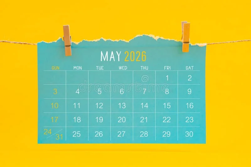May 2026 calendar tearing hanged with brown rope on yellow color background. May 2026 calendar stock images, royalty-free photos and pictures