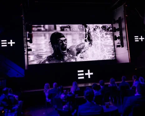 A video is shown at the the 2025 announcement of the Enhanced Games, which are about to commene in Las Vegas
