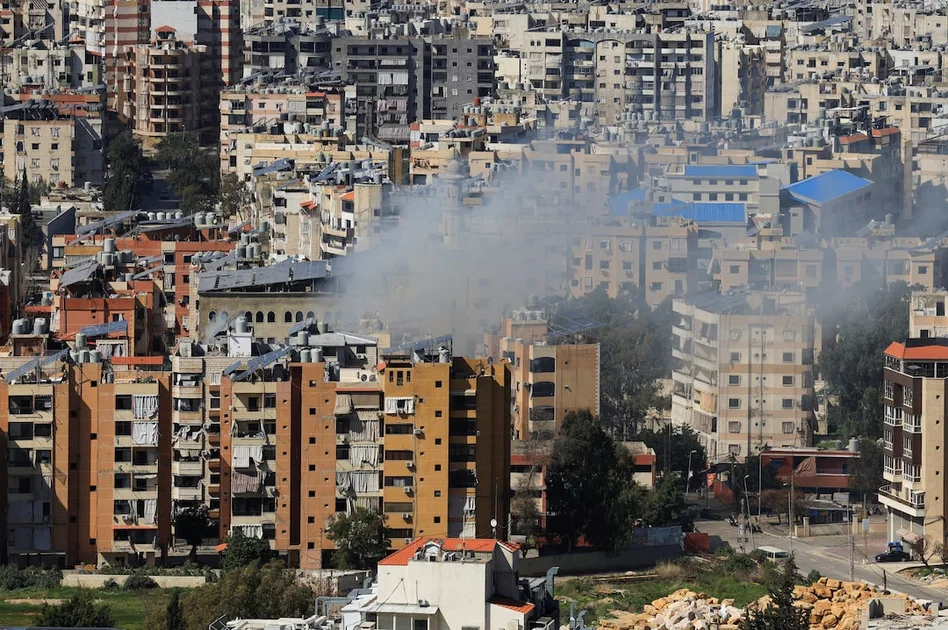 Smoke rises after an Israeli strike on Beirut's southern suburbs