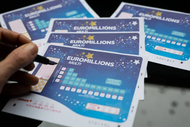Man is checking a box to pick numbers on a betting card for the EuroMillions jackpot in this photo illustration taken in Brussels, Belgium, on...