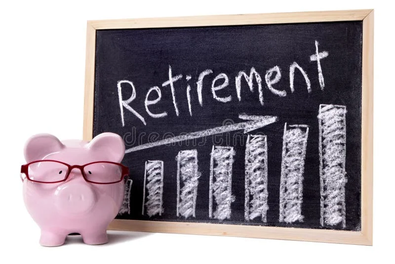 Pink piggy bank with glasses standing next to a blackboard with retirement savings message. Sharp focus on the piggy bank. Pink piggy bank with glasses standing next to a blackboard with retirement savings message. Sharp focus on the piggy bank.