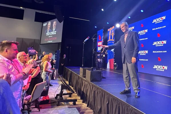 Georgia governor candidate Rick Jackson campaigns in Alpharetta, Ga., Monday, June 15, 2026, before the runoff against Lt. Gov Burt Jones on June 16. (AP Photo/Bill Barrow)