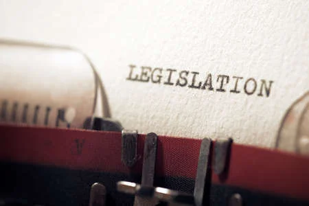 The word legislation written with a typewriter