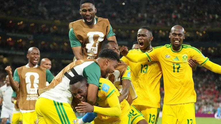 South Africa's Thapelo Maseko (12) celebrates after scoring his side's first goal during the World Cup Group A