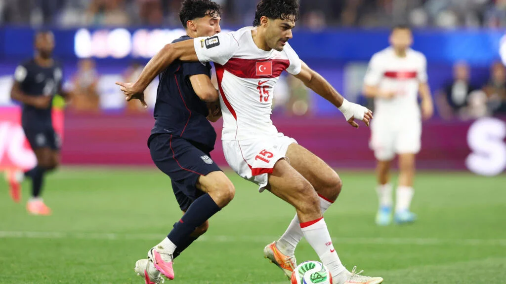 Turkey's Ozan Kabak in action with Ricardo Pepi.