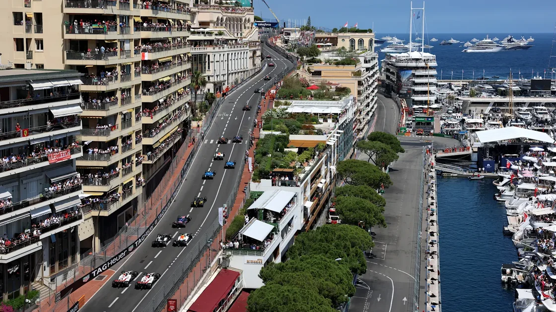 MONTE-CARLO, MONACO - JUNE 07: Esteban Ocon of France driving the (31) Haas F1 VF-26 Ferrari and Oliver Bearman of Great Britain driving the (87) Haas F1 VF-26 Ferrari chase the pack at the start during the F1 Grand Prix of Monaco at Circuit de Monaco on June 07, 2026 in Monte-Carlo, Monaco. (Photo by Steven Tee/Getty Images)