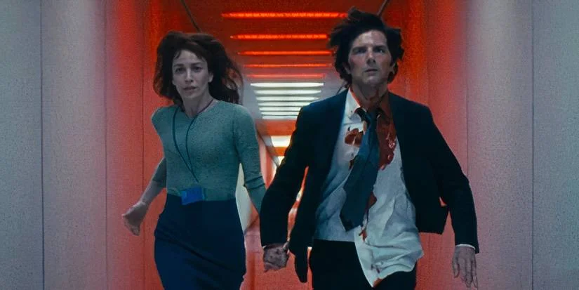 Mark and Helly running across a Lumon corridor in Severance season 2's ending
