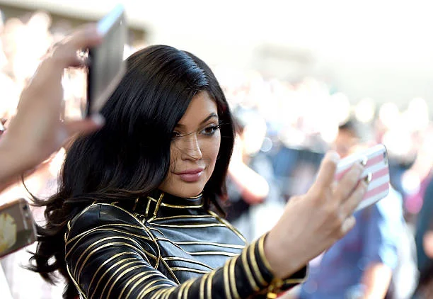 Personality Kylie Jenner poses for a selfie on the red carpet during the 2015 Billboard Music Awards at MGM Grand Garden Arena on May 17, 2015 in Las...