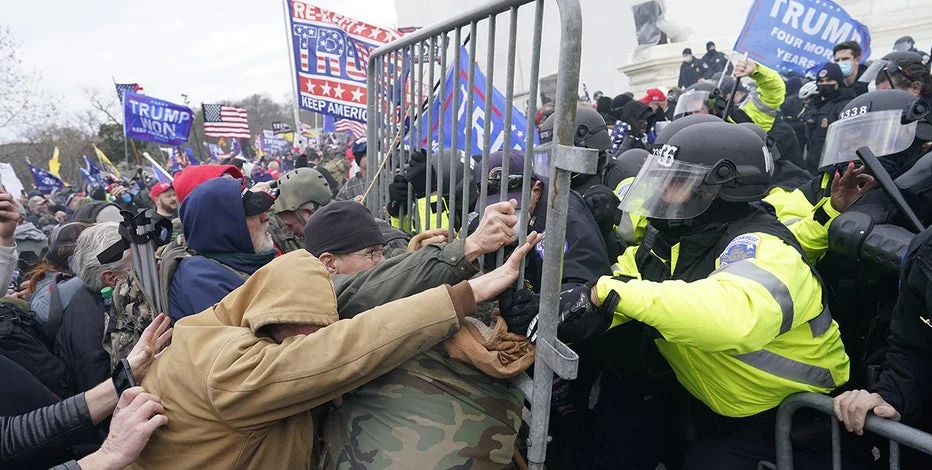 Justice Dept. urges court to toss out convictions of Proud Boys, Oath Keepers in Jan. 6 attacks