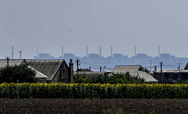 Zaporizhzhia Nuclear Power Plant is seen from Nikopol, that is 7 kilometers away from the power plants and therefore is under nuclear threat as the...