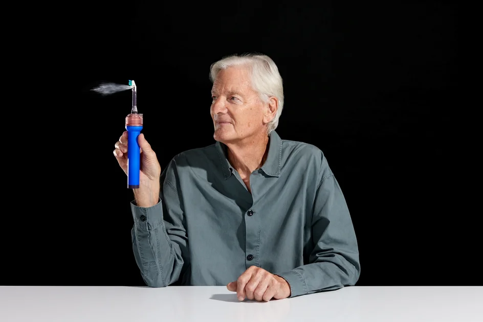 James Dyson presenting the new Dyson CameraJet toothbrush at the Paris launch event