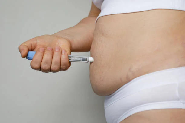 Woman making Semaglutide Injection Pen in her Stomach. Semaglutide Injection Diabetes Drug Being Used For Weight Loss. Woman making Semaglutide Injection Pen in her Stomach. Semaglutide Injection Diabetes Drug Being Used For Weight Loss. semaglutide stock pictures, royalty-free photos & images