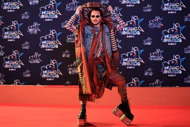 Star Academy dance teacher Yanis Marshall poses on the red carpet before attending the 24th edition of the NRJ Music Awards ceremony at the Palais...