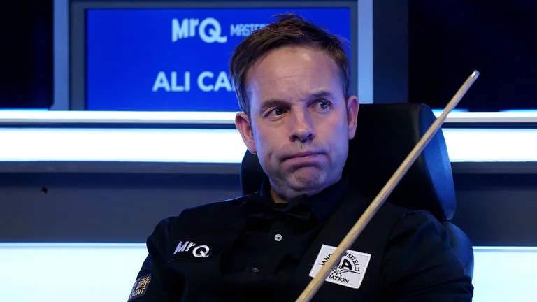 Ali Carter reacts on his chair during the MrQ Masters Final against Ronnie O'Sullivan (not pictured) on day eight of the MrQ Masters at Alex