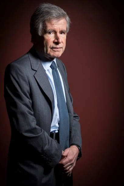 French businessman, political advisor and author Alain Minc is pictured during a photo session on February 22, 2017 in his office in Paris. / AFP /...
