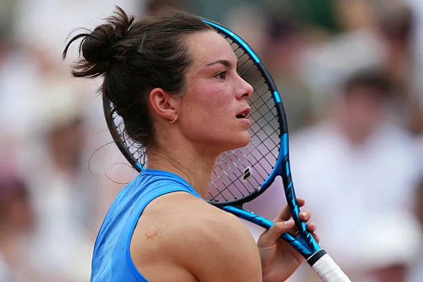 France's Lois Boisson reacts during her women's singles match against France's Elsa Jacquemot on day 7 of the French Open tennis tournament on Court...