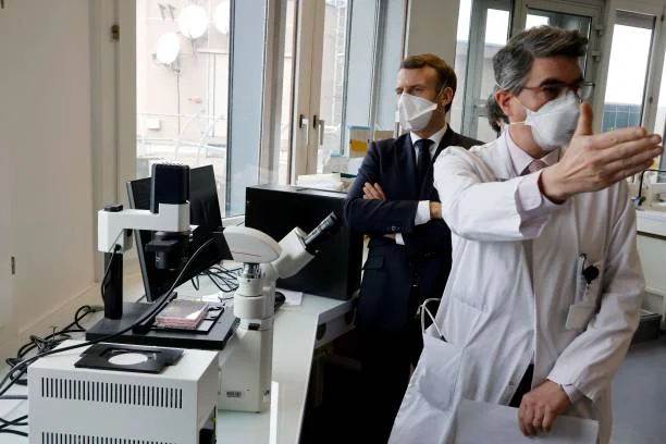 French President Emmanuel Macron visits Gustave Roussy Institute, a regional centre for the fight against cancer, with the Institute's general...