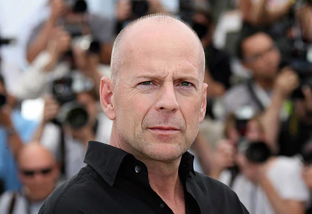 Actor Bruce Willis poses during a photocall for US directors Tim Johnson and Karey Kirkpatrick's film 'Over the Hedge' at the 59th edition of the...