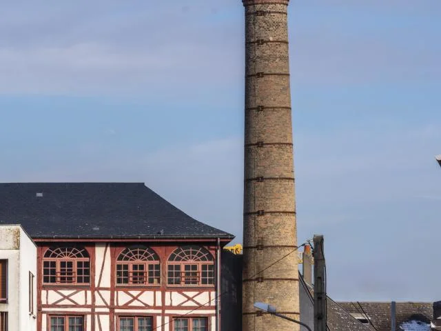 ancienne fabrique de drap de laine Elbeuf Architecture métropole rouennaise Normandie passé industriel patrimoine bâtiment historique savoir faire artisanat