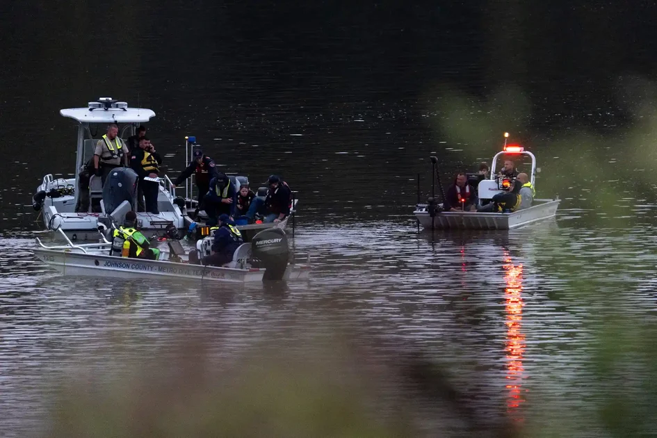 Emergency response personnel search a portion of the Iowa River near the Lake Macbride spillway Sept. 22, 2026 near Solon, Iowa.