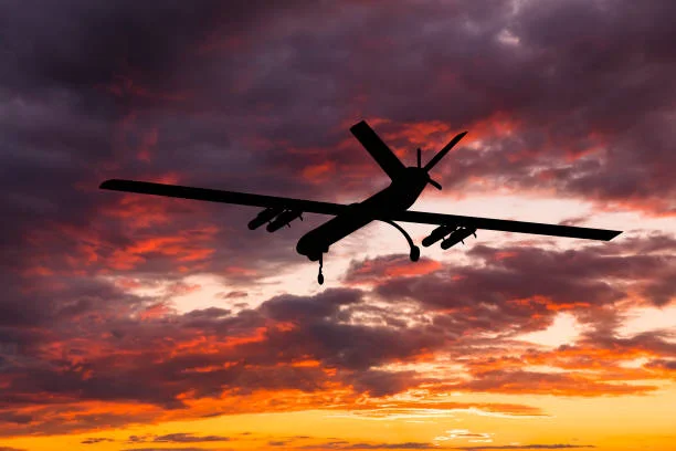 iranian military unmanned aerial vehicle at sunset. combat drone - combat drone stock pictures, royalty-free photos & images